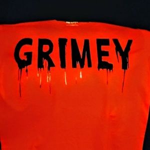 Red Grimey t shirt with black letters